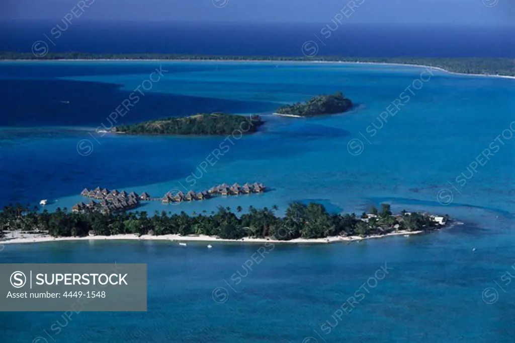 View at palm beach and the waterbungalows of Moana Beach hotel, Bora Bora, French Polynesia, Oceania