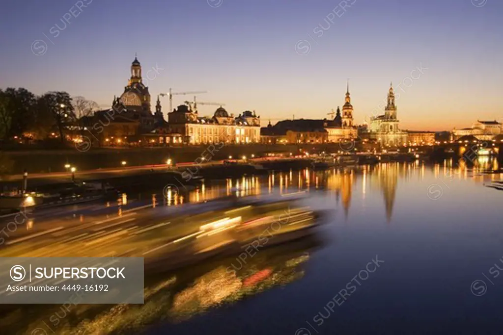 Deutschland, Dresden, panoramic view from bridge over river Elbe at sunset, Fraunekirche, Hofkirche, Semper opera house, tour boat