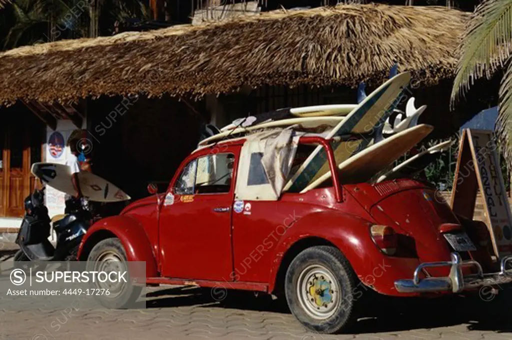 Old beetle car with surfboards, Puerto Escondido, Oaxaca, Mexico, America