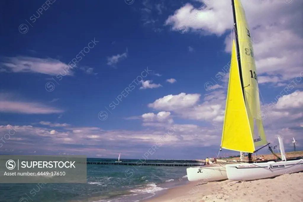 Catamaran on the beach on the west coast near Wustrow, Darss, Baltic Sea, Mecklenburg Western Pomerania, Germany