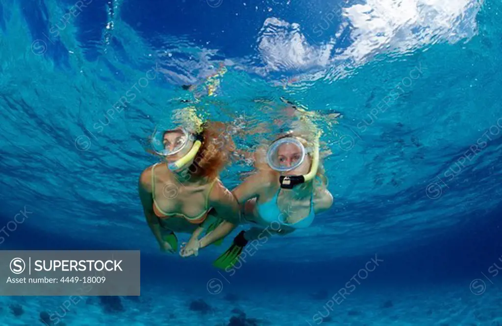 Two snorkeling girls, Komodo National Park, Indian Ocean, Indonesia