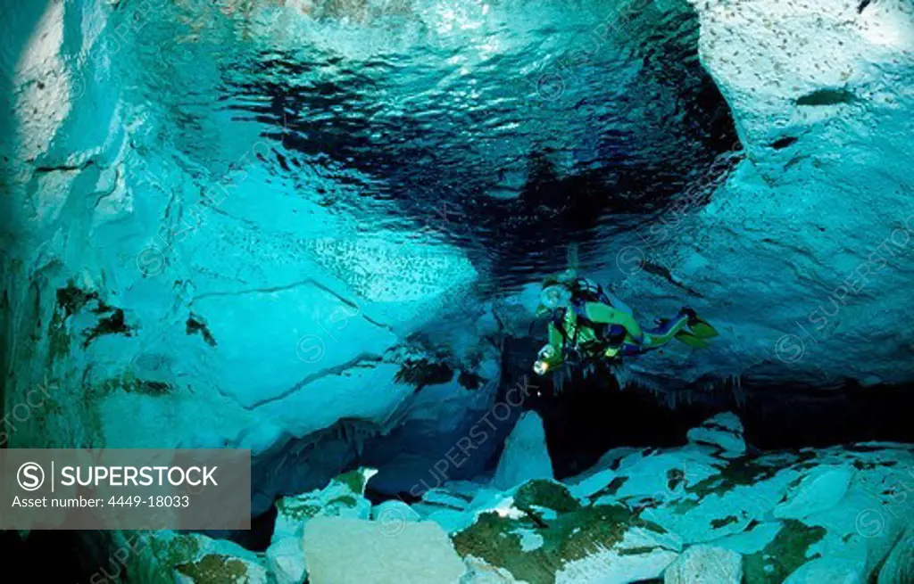 Scuba diver in underwater cave Cueva Taina, Punta Cana, Freshwater, Dominican Republic
