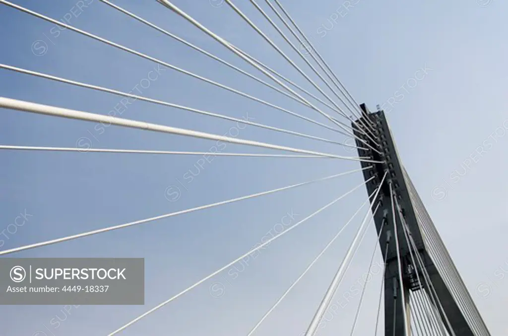 Steel cables of a bridge shining in the sunlight, Warsaw, Poland