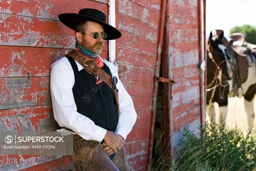 cowboy at barn, wildwest, Oregon, USA