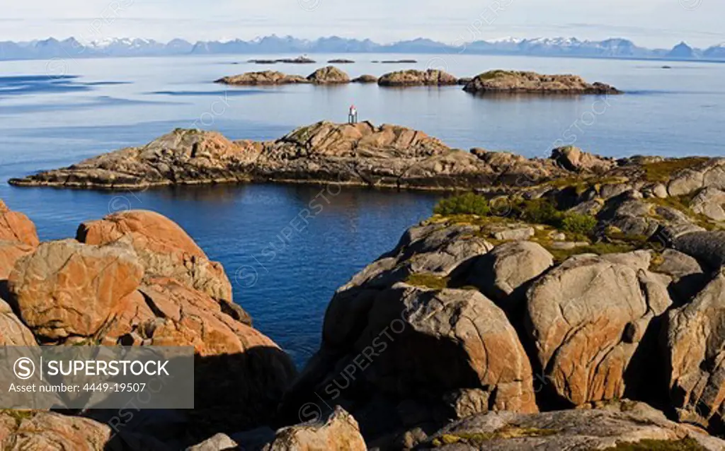 View of the skerry coast of Kalle, Norwegan mainland in the background, Austvagoya Island, Lofoten, Norway