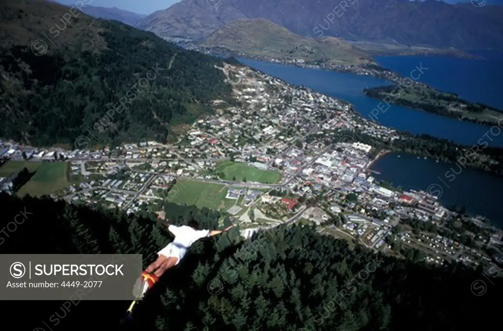 Man Bungee Jumping above Queenstown, South Island, New Zealand