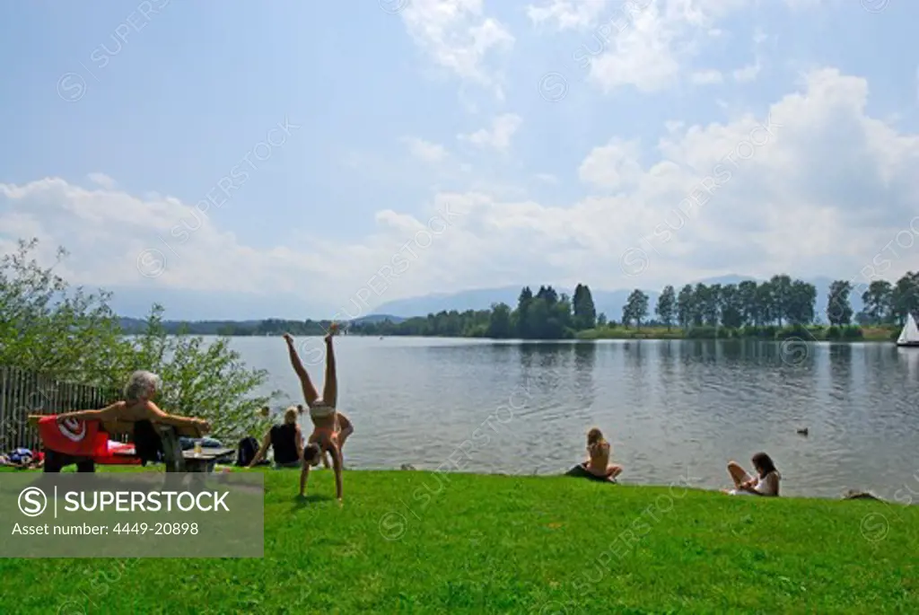 bathers at shore of lake Staffelsee, Upper Bavaria, Bavaria, Germany
