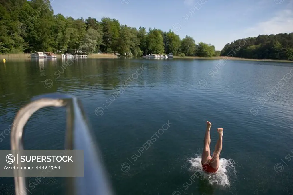 Diving Into Lake, Diving into lake, Crown Blue Line Grand Classique Houseboat, Lake Zotzensee, Mecklenburgian Lake District, Germany