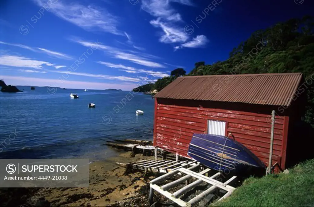 Boathouse in a small bay, Steward Island, New Zealand