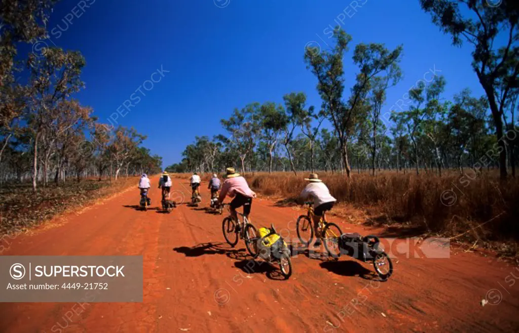 Cyclists on the road to Drysdale River Station, Gibb River Road, Western Australia, Australia