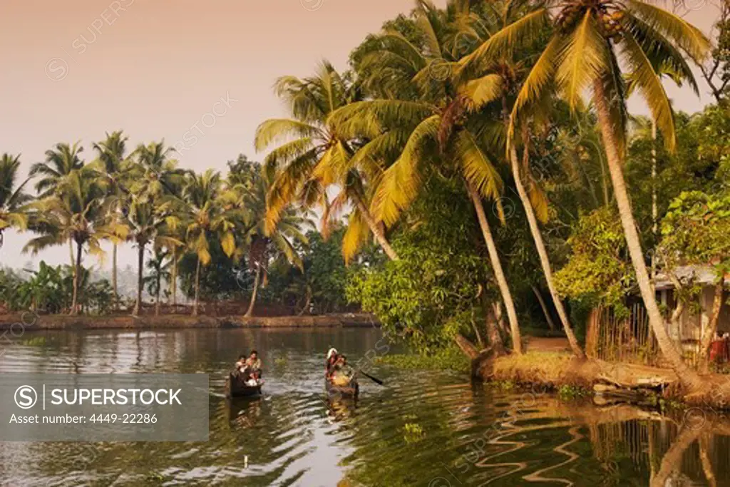 India Kerala backwaters indian people in canoe