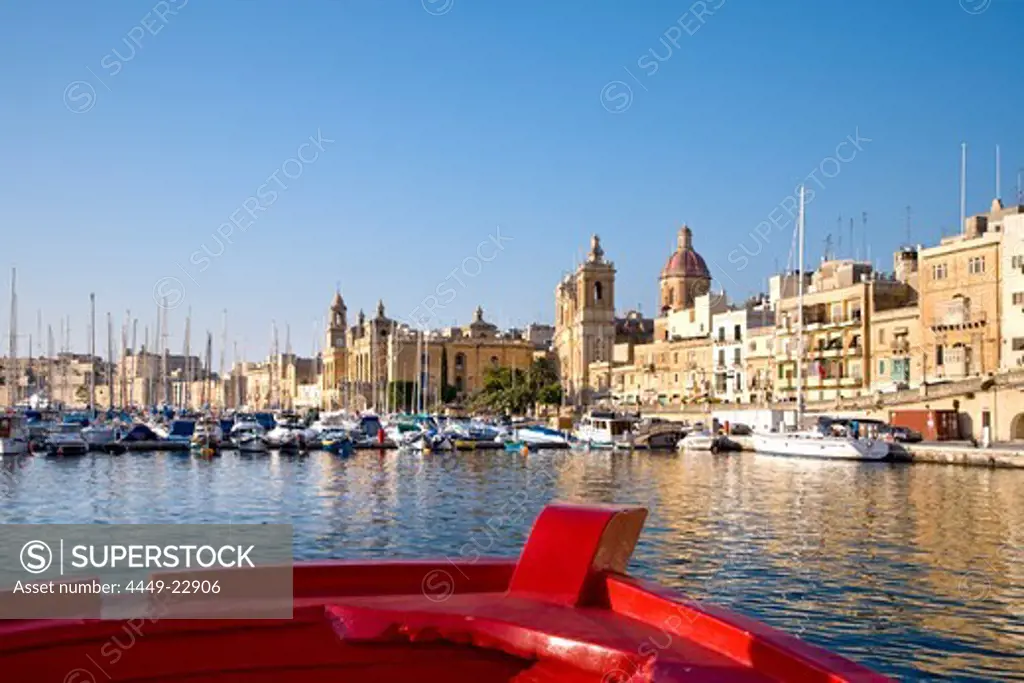 View from a boat at harbour and city in the sunlight, Vittoriosa, Valletta, Malta, Europe