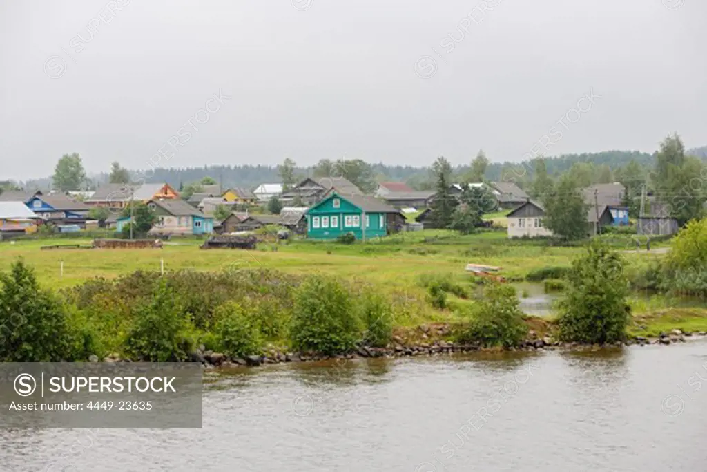 Residential buildings on Sheksna river in Goritsy, Oblast Vologda, Russia