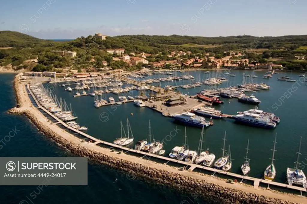 Aerial view of Porquerolles with city and boats at the quai, Iles d'Hyeres, France, Europe