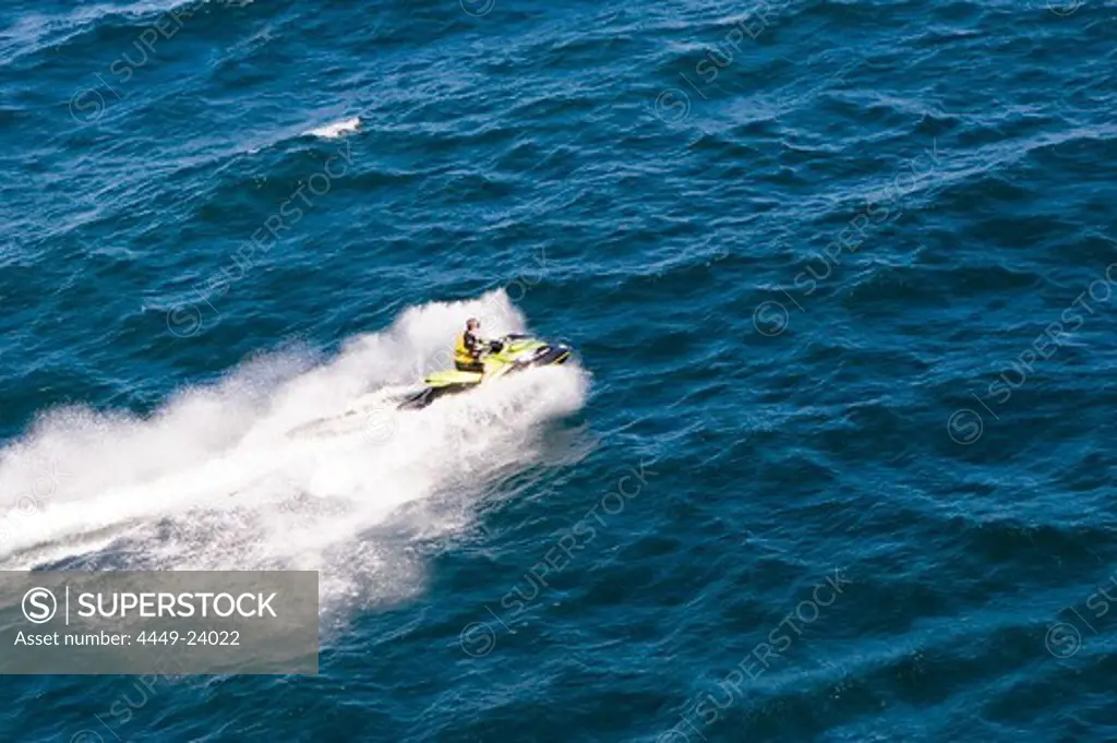 Aerial view of a person on a jet ski, Iles d'Hyeres, France, Europe