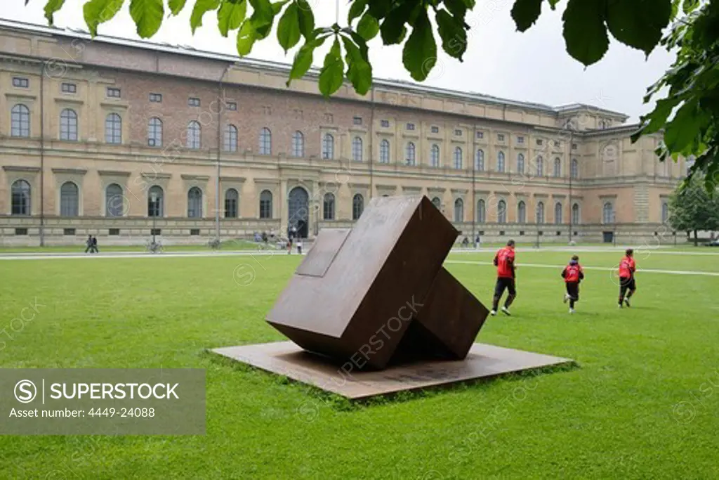 A sculpture and joggers in front of Museum Alte Pinakothek, Munich, Bavaria, Germany