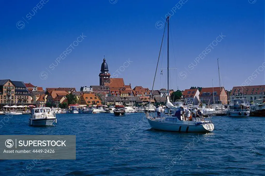 Boats in the harbour, Lake Mueritz, Mecklenburg lake district, Mecklenburg-Vorpommern, Germany
