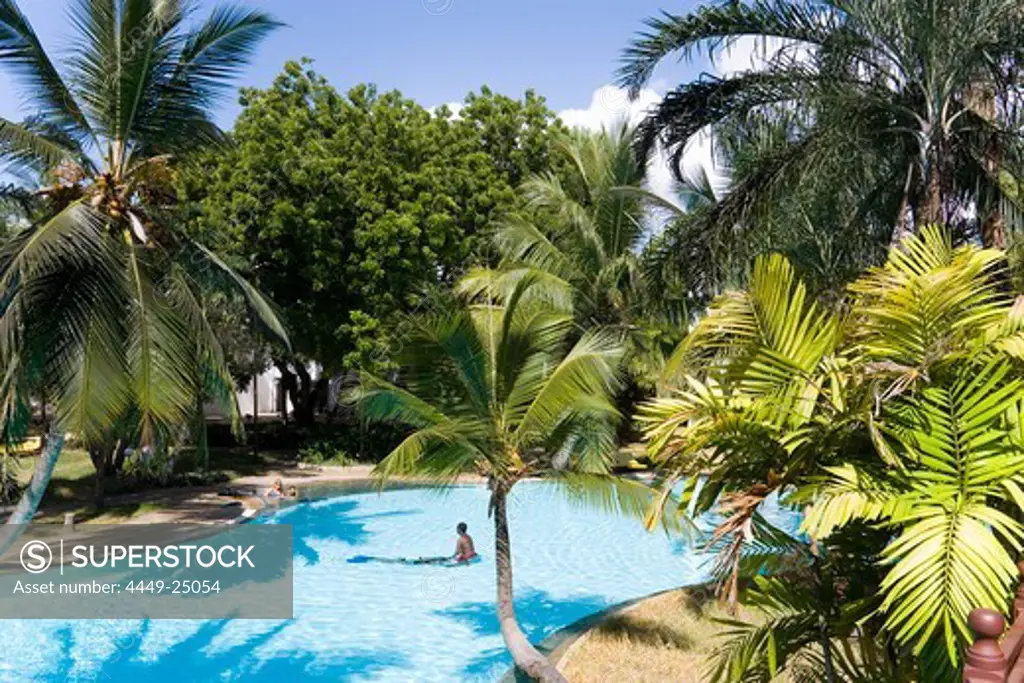 Guests bathing in the swimming pool, Sarova Whitesands Beach Resort and Spa, Shanzu Beach, Coast, Kenya