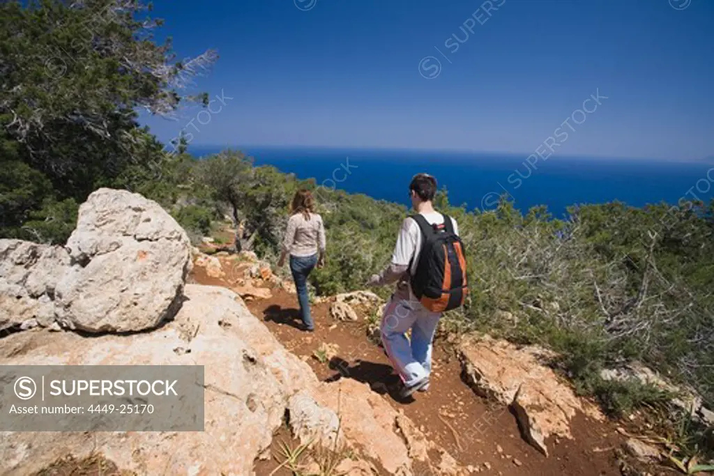 People hiking to Moutis tis Sotiras, 370m, Aphrodite trail, Jalos Activ Tour, Akamas Nature Reserve Park, South Cyprus, Cyprus