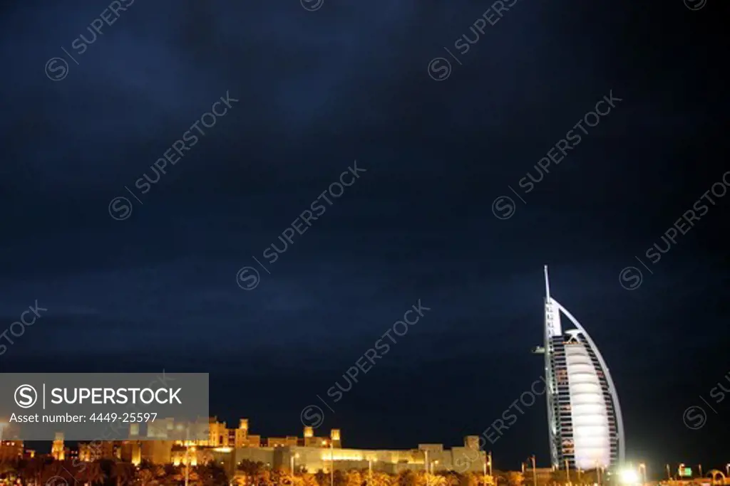 Evening sky over Burj al Arab and Mina A Salam Hotel, Madinat Jumeirah, Dubai, United Arab Emirates, UAE