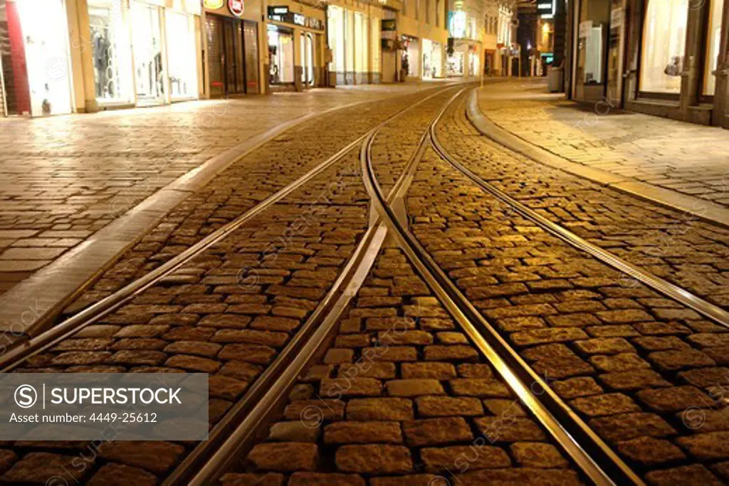 Tram lines in the Old Town of Ghent at night, Flanders, Belgium