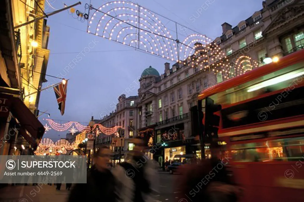 Christmas lights above people at Regent Street, London, England, Great Britain, Europe