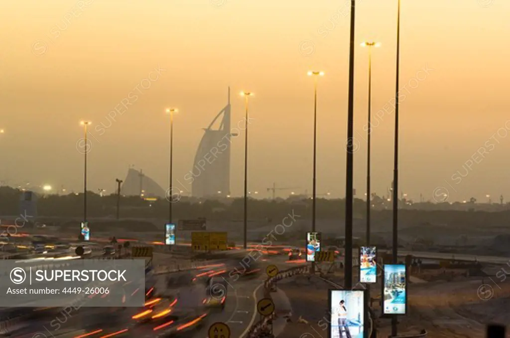 Dubai skyline in the evening light, Burj al Arab in the background, Traffic chaos, Dubai, United Arab Emirates