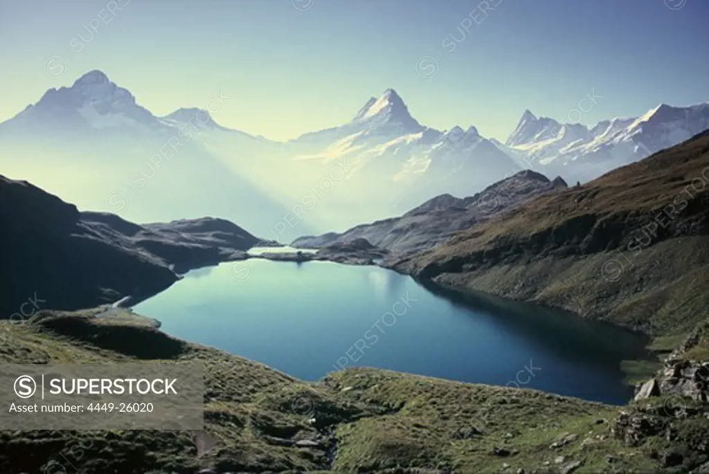 Hiking at Bachalpsee lake with Schreckhorn and Eiger, over Grindelwald, Bernese Oberland, Switzerland