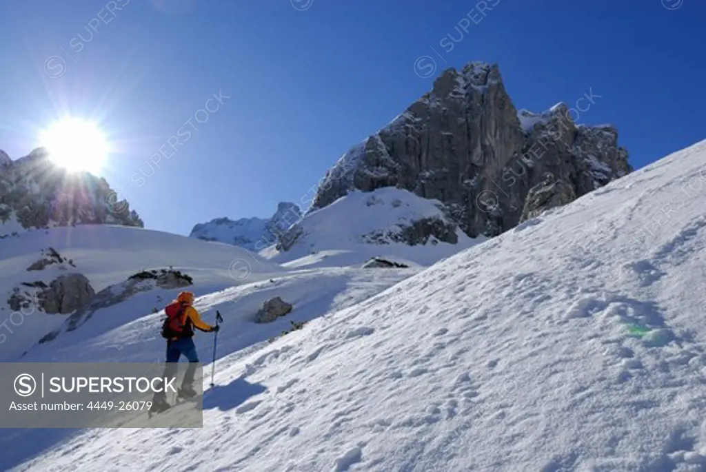 Female backcountry skier ascenting, Griesner Kar, Wilder Kaiser, Kaiser range, Tyrol, Austria
