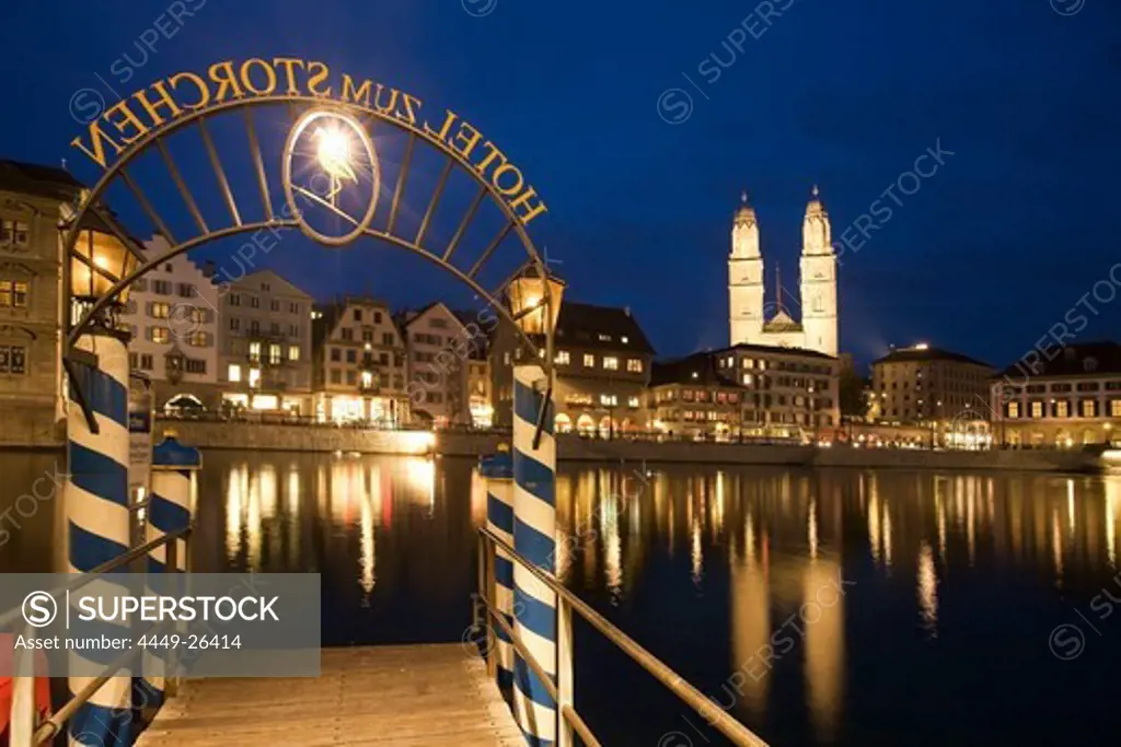Switzerland, Zurich, old town center, river Limmat at night, Limmatquai Grossmunster, Pier Hotel Storchen