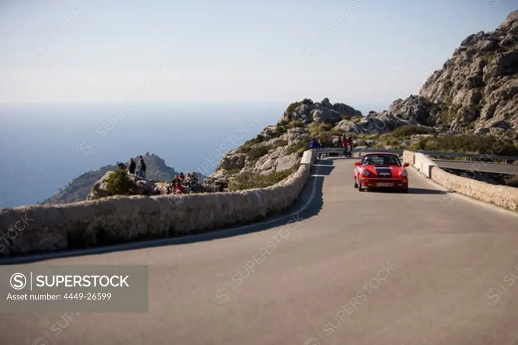 Porsche 911 on Bowtie Curve of Sa Calobra Mountain Road, Rally Classico Isla Mallorca, near Cala de Sa Calobra, Mallorca, Balearic Islands, Spain