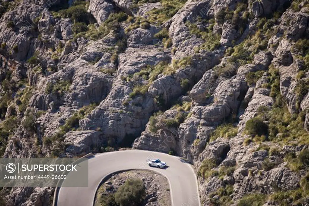 Porsche 911 on Serpentines of Sa Calobra Mountain Road, Rally Classico Isla Mallorca, near Cala de Sa Calobra, Mallorca, Balearic Islands, Spain