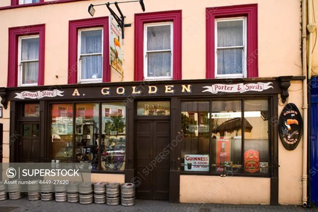 Pub with beer barrels in Macroom, County Cork, Ireland, Europe