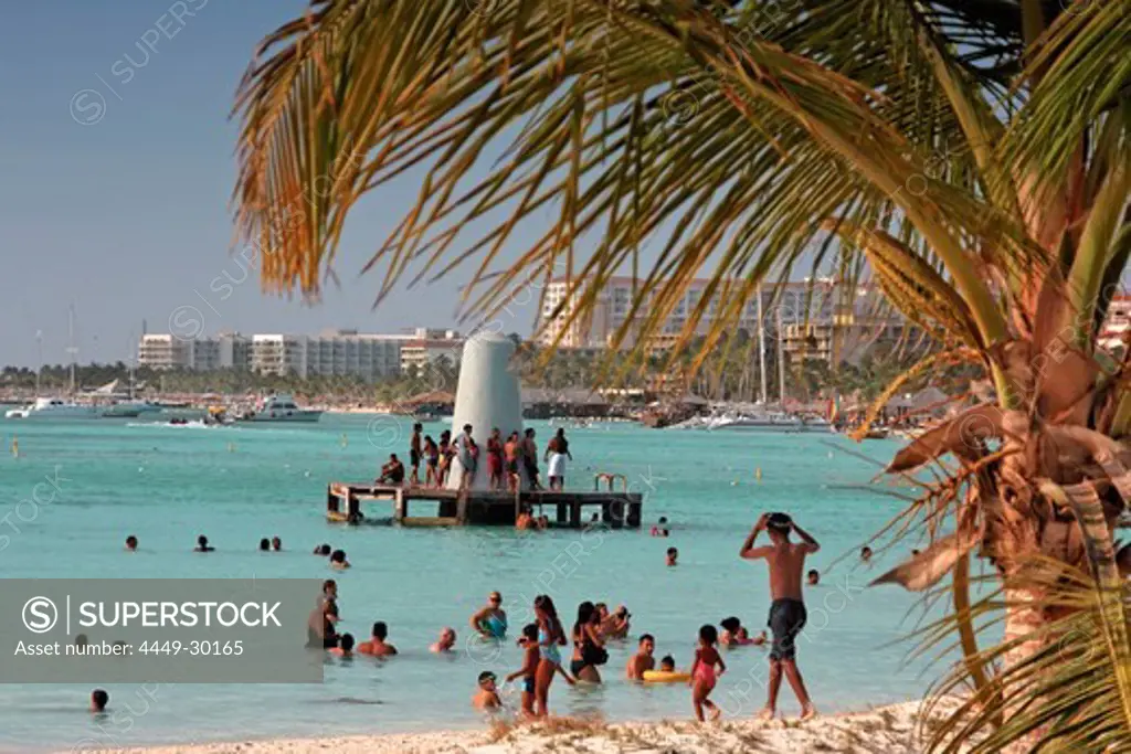 Aruba, Palm Beach, West Indies, Dutch Carribean, Central America, local people at the beach on sunday