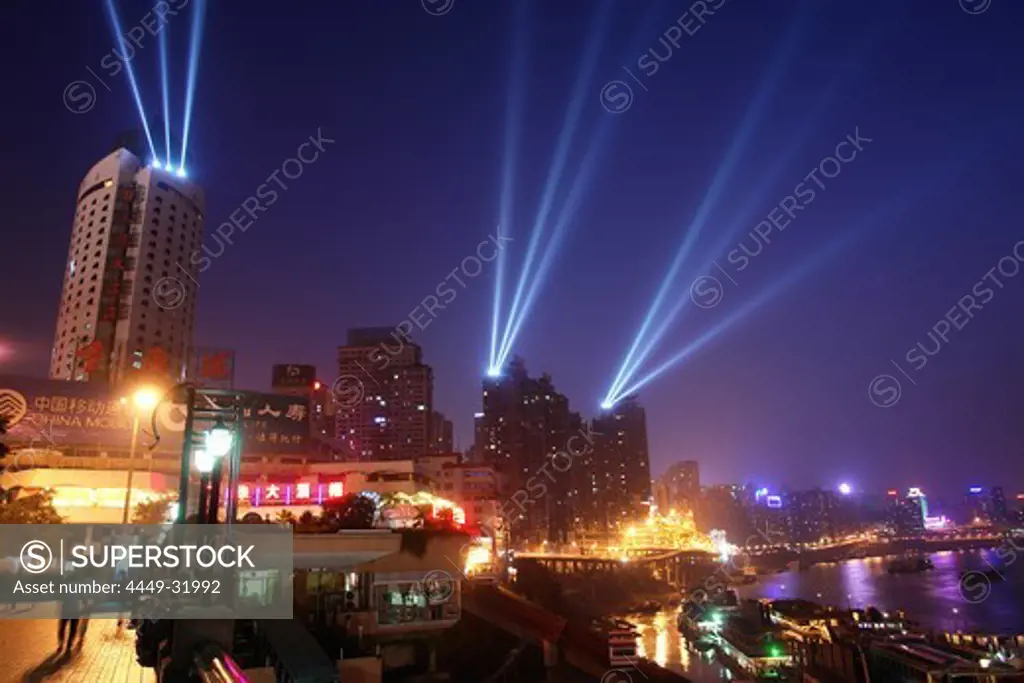 Evening athmosphere with floodlights on skyscrapers in Chongqing, China, Asia