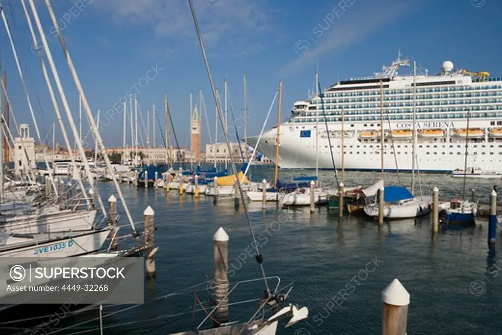 Cruiseship Costa Serena and Campanile Tower seen from San Giorgio Marina, Venice, Veneto, Italy