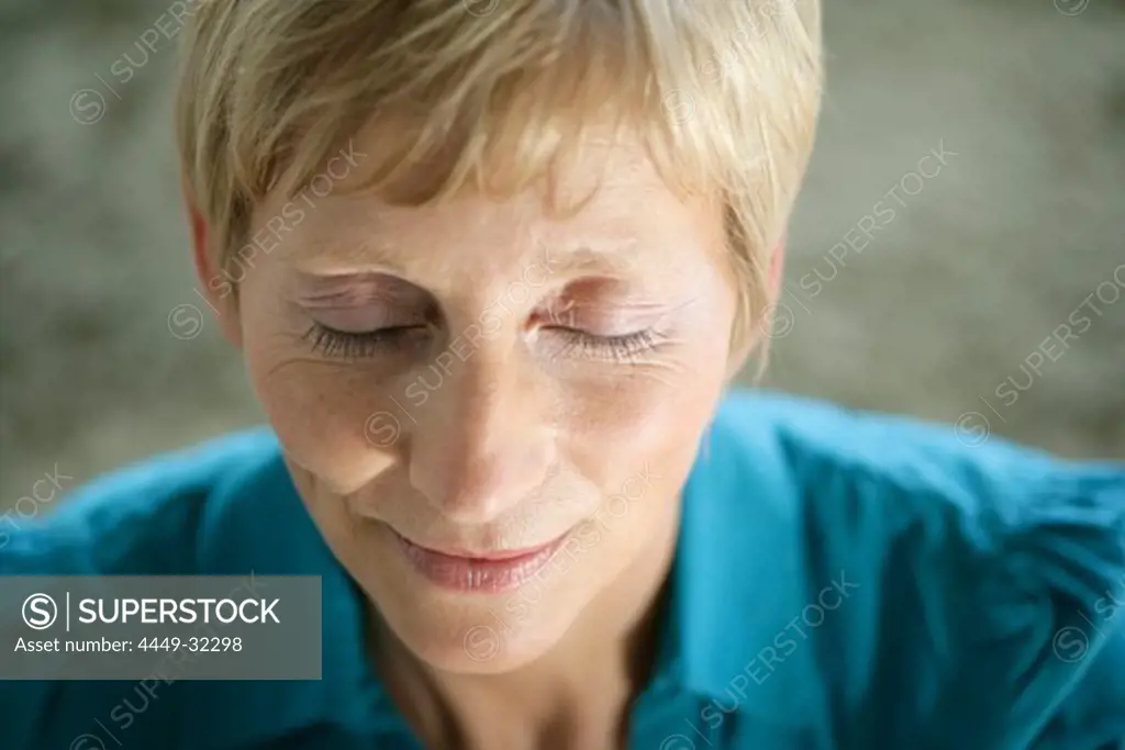 Mature woman with closed eyes, close-up, Styria, Austria