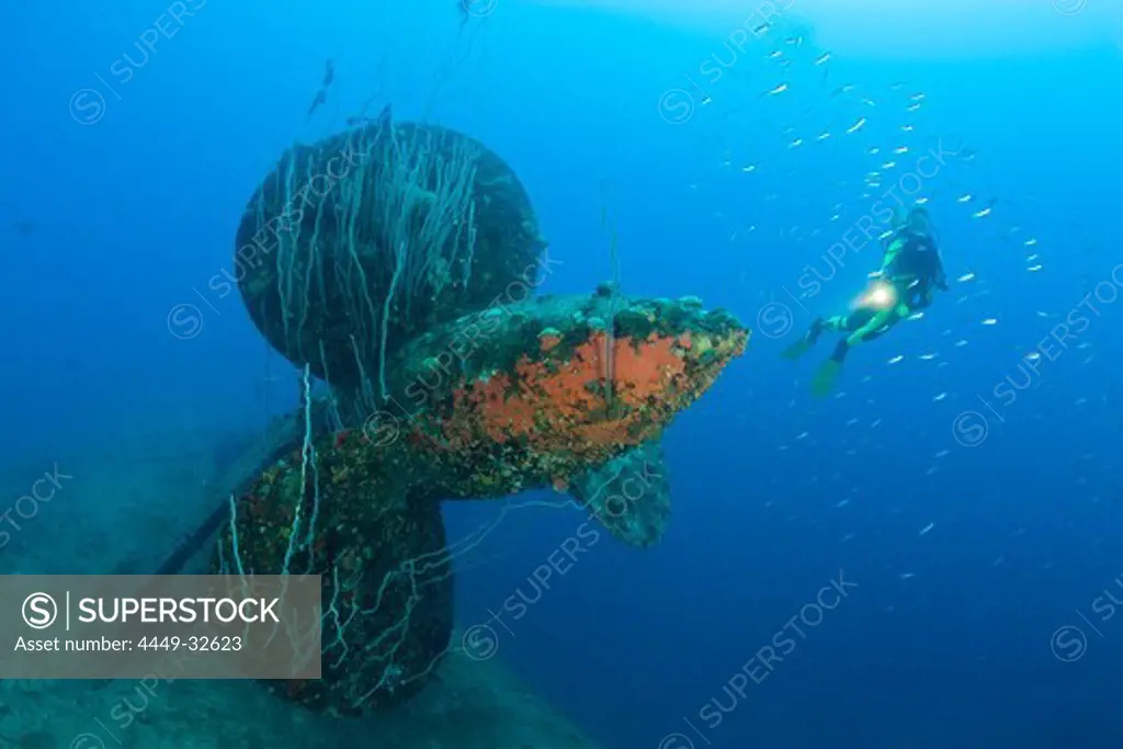 Diver at Propeller of HIJMS Nagato Battleship, Marshall Islands, Bikini Atoll, Micronesia, Pacific Ocean