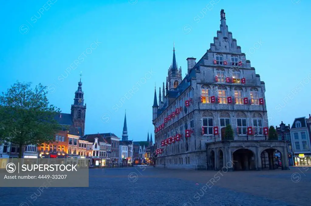 Market place with gothic town hall and church in the evening, Old Town, Gouda, Netherlands, Europe