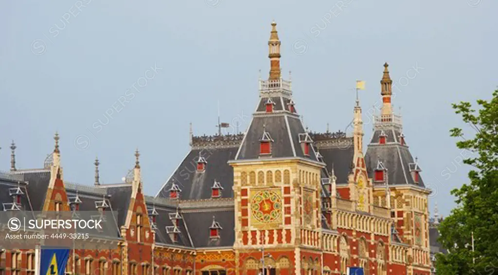 View at the Central station under blue sky, Amsterdam, Netherlands, Europe