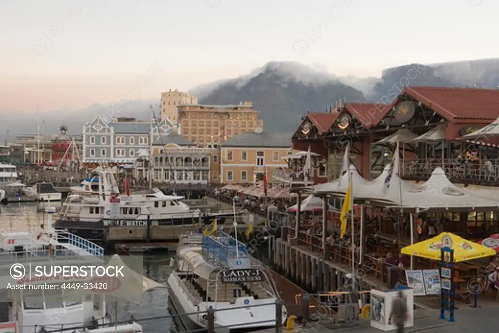 Boats in the harbour at dusk, Waterfront and Table Mountain in the background, Cape Town, Western Cape, South Africa, Africa