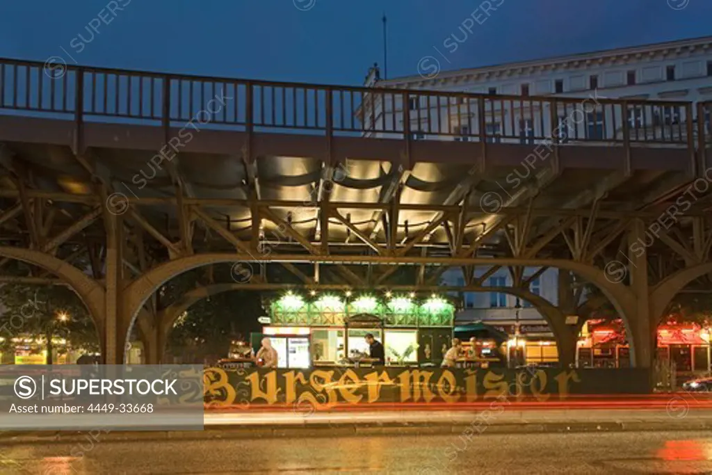 Illuminated snack under the subway station in the evening, Schlesisches Tor, Berlin, Germany, Europe