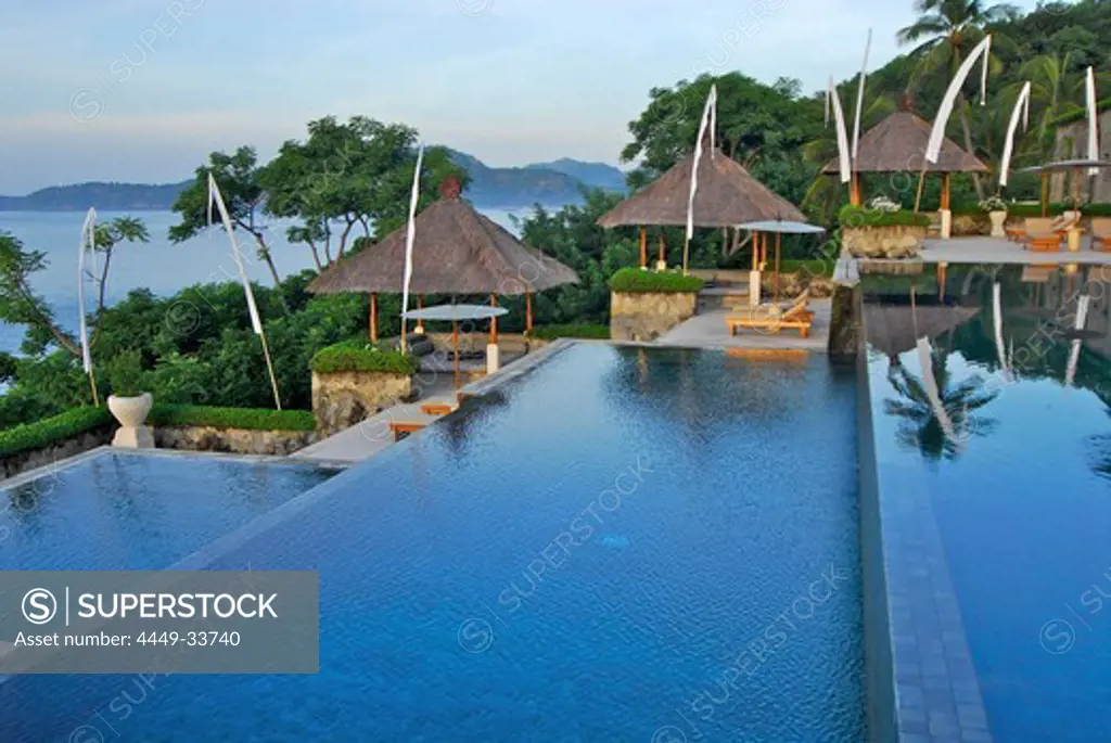 The deserted Infinity pool at Amankila Resort in the morning, Candi Dasa, Eastern Bali, Indonesia, Asia
