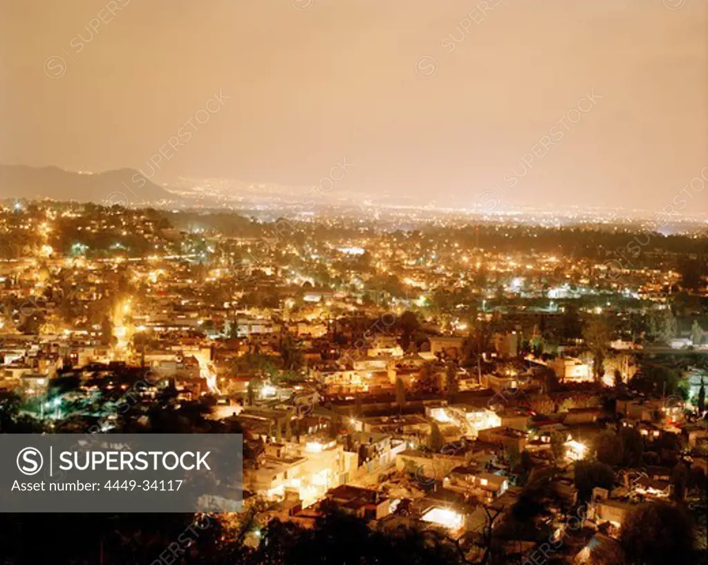 View from Barrio Xochimilco at the lights of Mexico City, Mexico, America