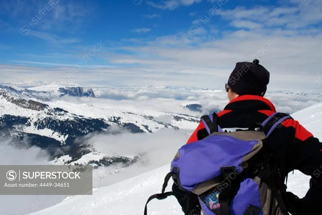 Person on a ski tour dmiring the view, Mountain landscape, Seiser Alp, Durontal, Molignon, Saltria, South Tyrol, Italy
