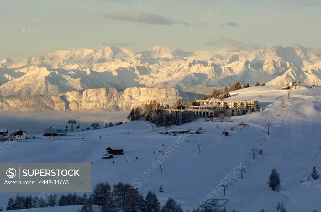 Alpine hotel and chair lift with mountain landscape, Seiser Alp, South Tyrol, Italy