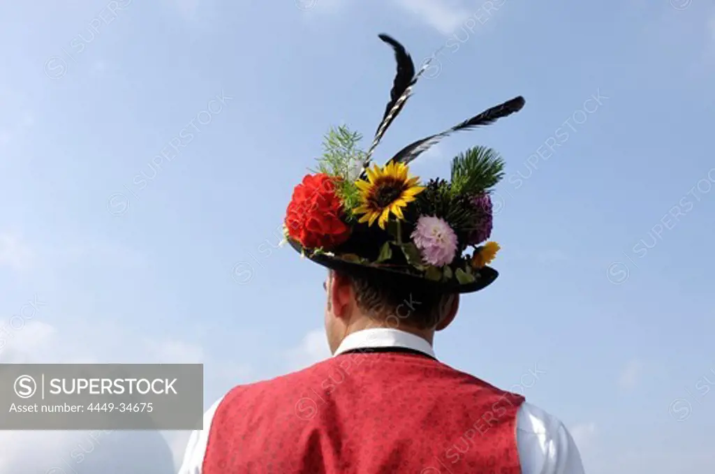 Shepherd with Traditional clothing, hat, Returning to the valley from the alpine pastures, Seiser Alm, South Tyrol, Italy