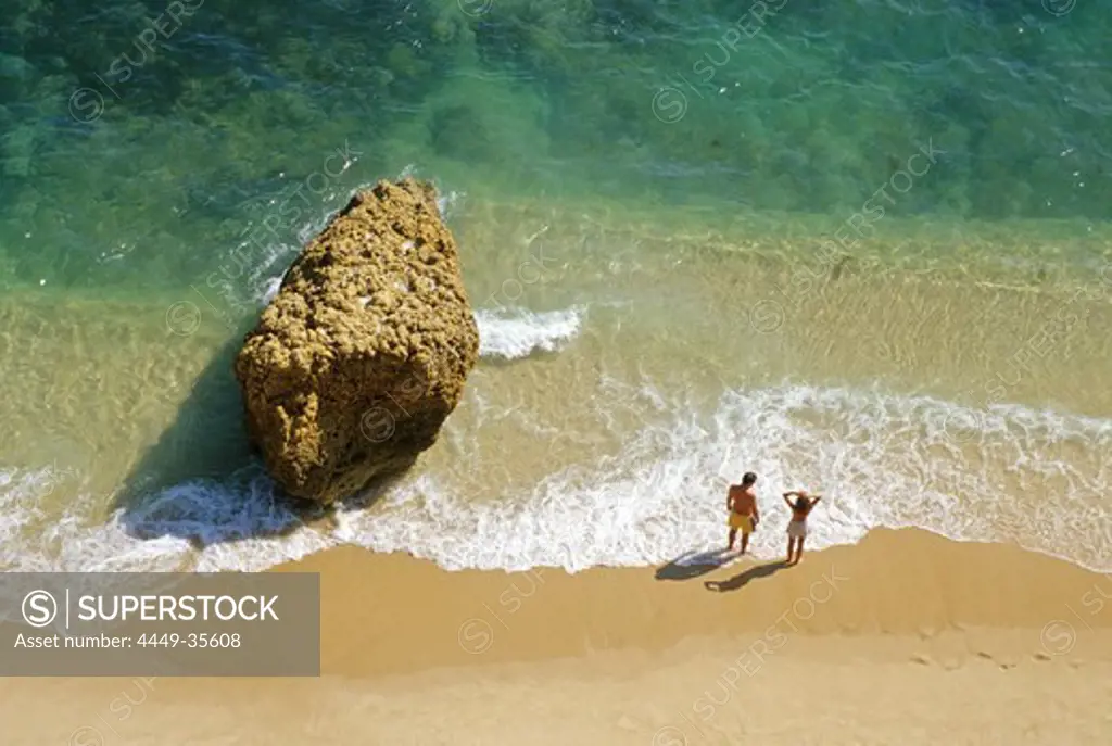 View at the beach and people on the waterfront, Praia da Marinha, Algarve, Portugal, Europe