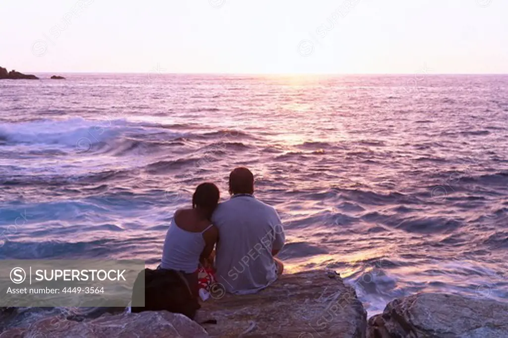 Couple at the beach, seaside, sunset, Centuri-Port, Cap Corse, Corsica, France