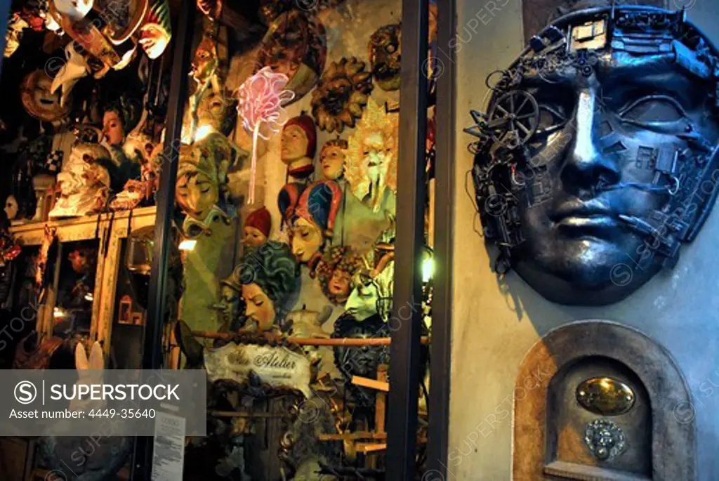 Masks in the shop window of Alice Atelier, Via Faenza, Florence, Tuscany, Italy, Europe